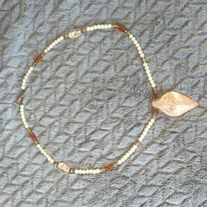 Handmade fashion necklace pearls with a unique pendant.